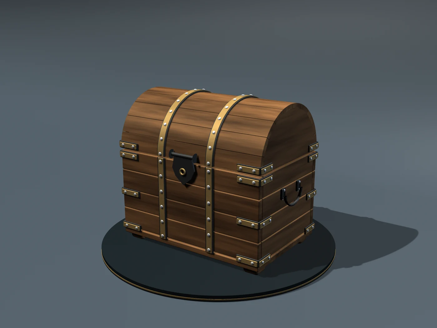 Closed wooden chest with a domed lid, brass bands and rivets on a circular display stand