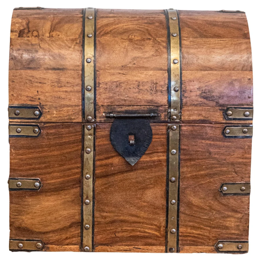 Reference photograph of a real vintage wooden chest with brass straps